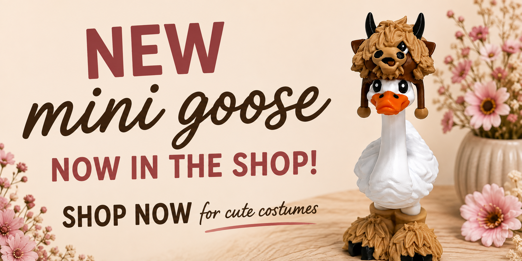Promotional banner for a new mini goose costume, featuring a small white goose figurine wearing a fluffy brown costume hat and matching fluffy boots, next to text that reads 'NEW mini goose NOW IN THE SHOP! SHOP NOW for cute costumes'.